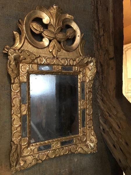 Miroir à parcloses époque régence en bois doré