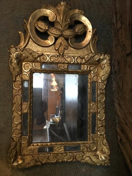 Miroir à parcloses époque régence en bois doré