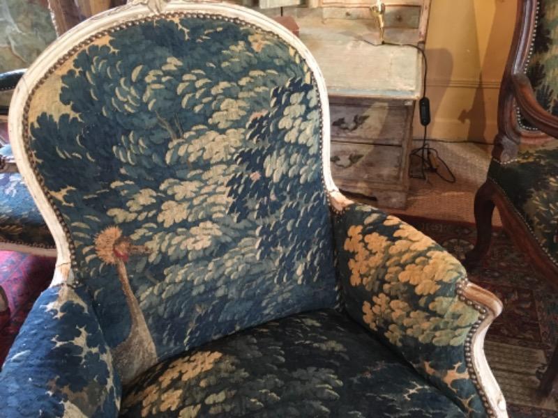 Bergère peinte époque LXV recouverte d’une tapisserie XVIII ème 