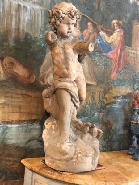 Cupidon en terre cuite XVIII ème ( accidents )