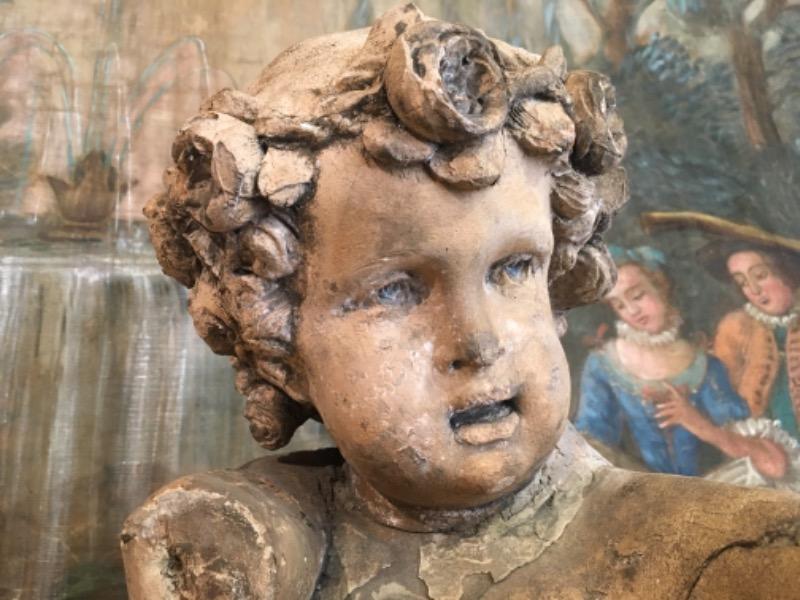 Cupidon en terre cuite XVIII ème ( accidents )