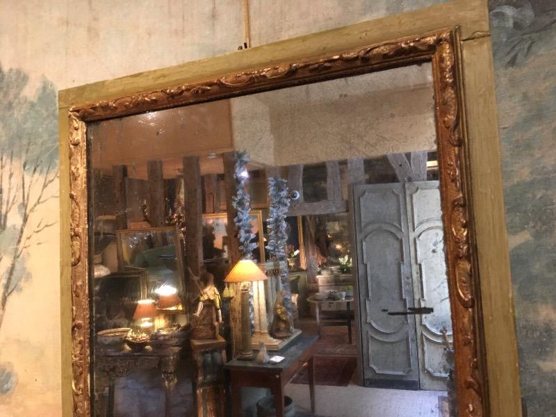 Miroir de boiserie XVIII ème ( baguette bérain en bois doré )