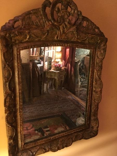 Miroir époque régence encadrement en bois sculpté 