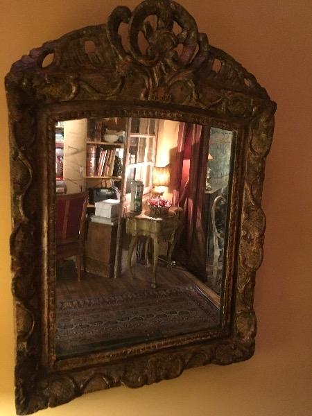 Miroir époque régence encadrement en bois sculpté 